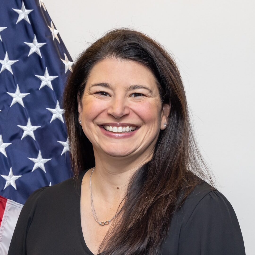 Smiling woman with American flag background