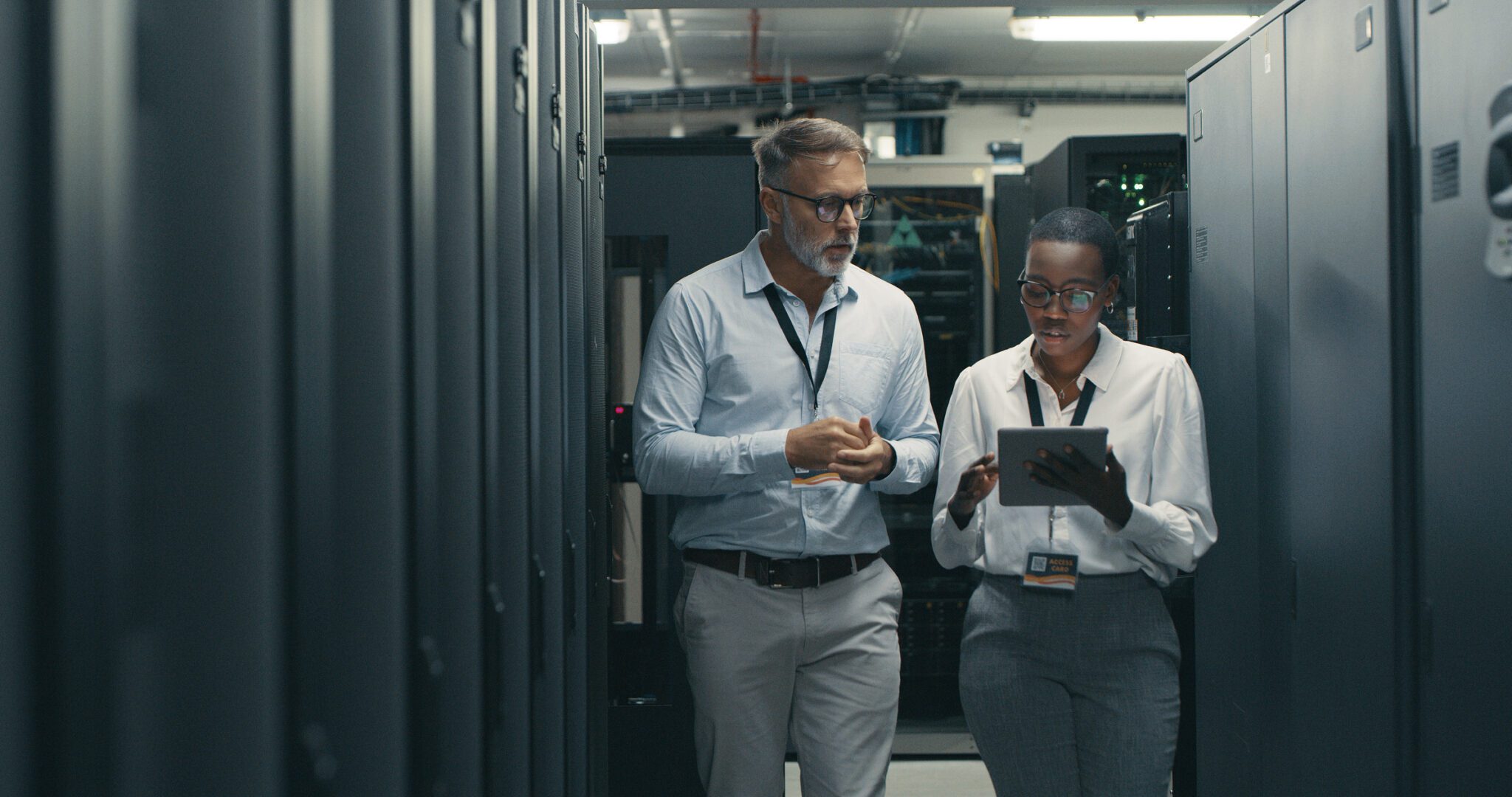 Data center technicians discussing work