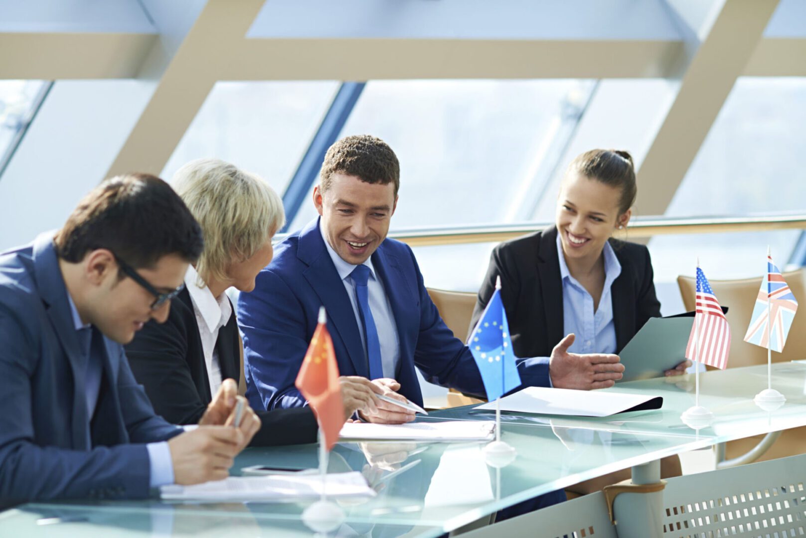 Professionals discussing at conference table