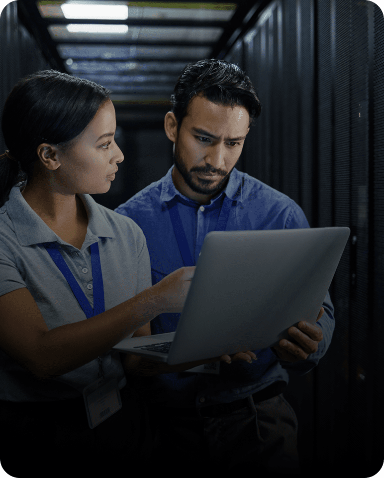Technicians discussing data center operations